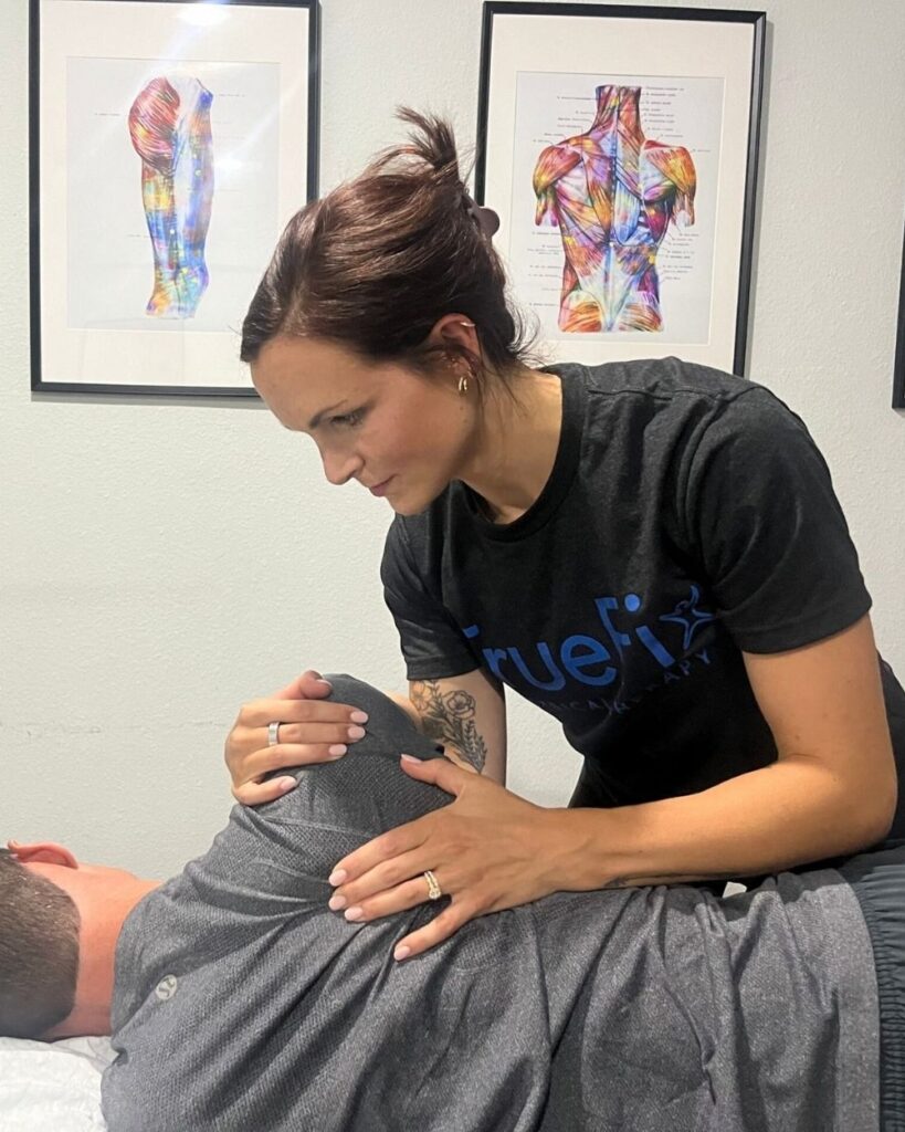 Physical therapist performs neck therapy at TrueFix Physical Therapy in Mansfield, TX.